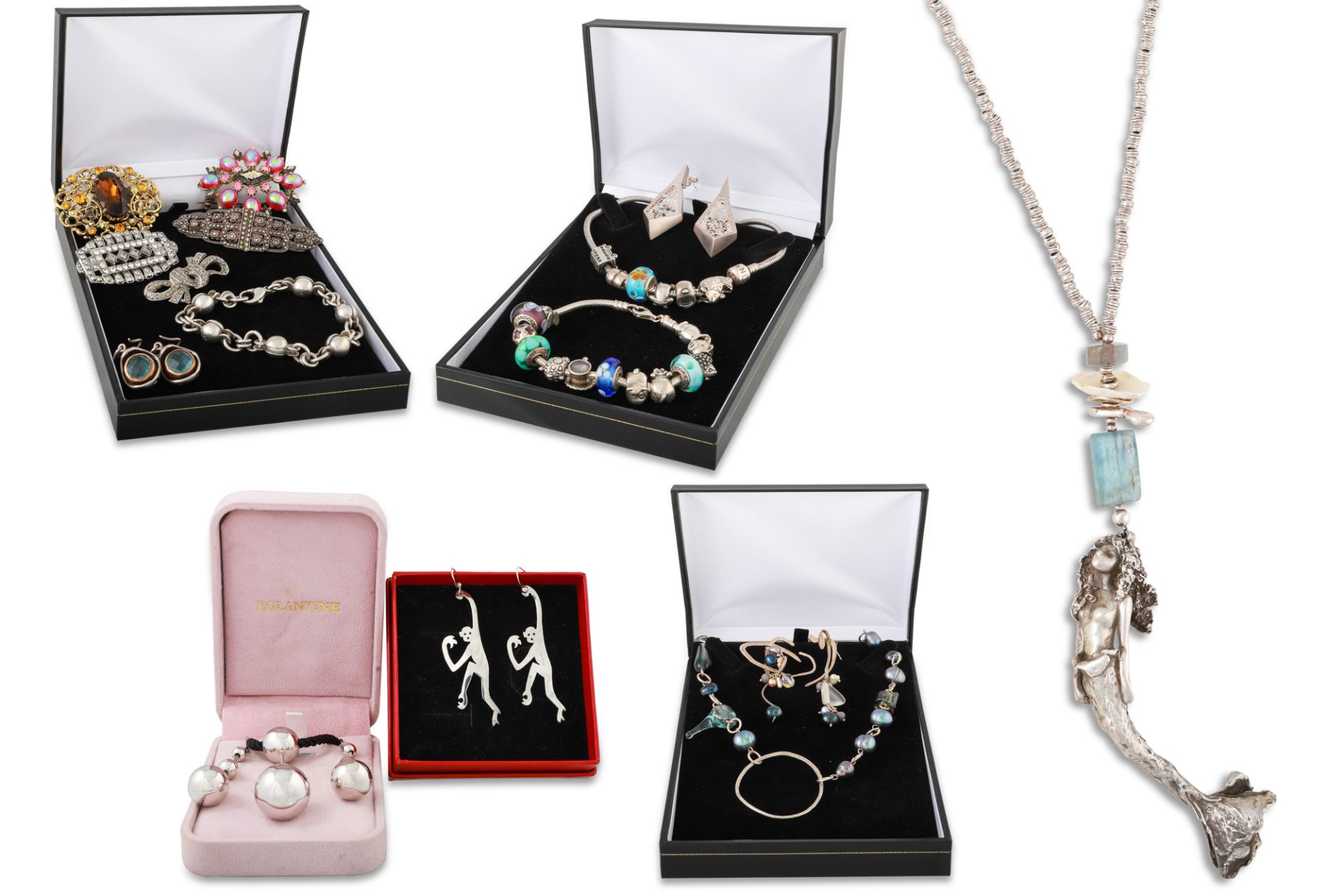AN INTERESTING COLLECTION OF IRISH HANDCRAFTED SILVER JEWELLERY PIECES, together with a