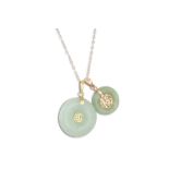 TWO JADE PENDANTS, of circular form, oriental design in 14ct gold, on a 9ct gold chain