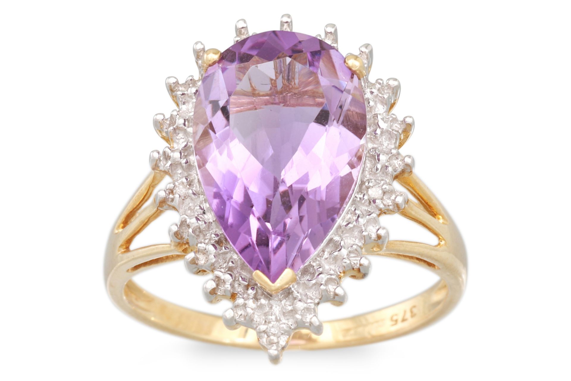 A DIAMOND AND AMETHYST RING, the pear shaped amethyst to diamond surround, mounted in 9ct yellow