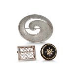 AN ANTIQUE CIRCULAR INLAID TORTOISESHELL BROOCH, together with a Celtic style silver brooch and a