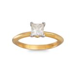 A DIAMOND SOLITAIRE RING BY TIFFANY & CO., the princess cut diamond mounted in 18ct yellow gold,