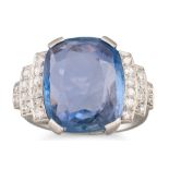 AN ART DECO SAPPHIRE AND DIAMOND RING, the cushion cut sapphire to stepped old cut diamond