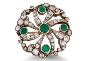 AN ANTIQUE EMERALD AND DIAMOND BROOCH, of openwork circular design, set with circular emeralds and