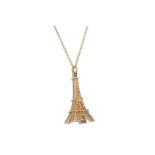 A GOLD CHARM, in the form of the Eiffel Tower, in 9ct gold on a 18ct gold neck chain, gross weight