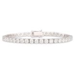 A DIAMOND LINE BRACELET, the round brilliant cut diamonds mounted in 18ct white gold. Estimated: