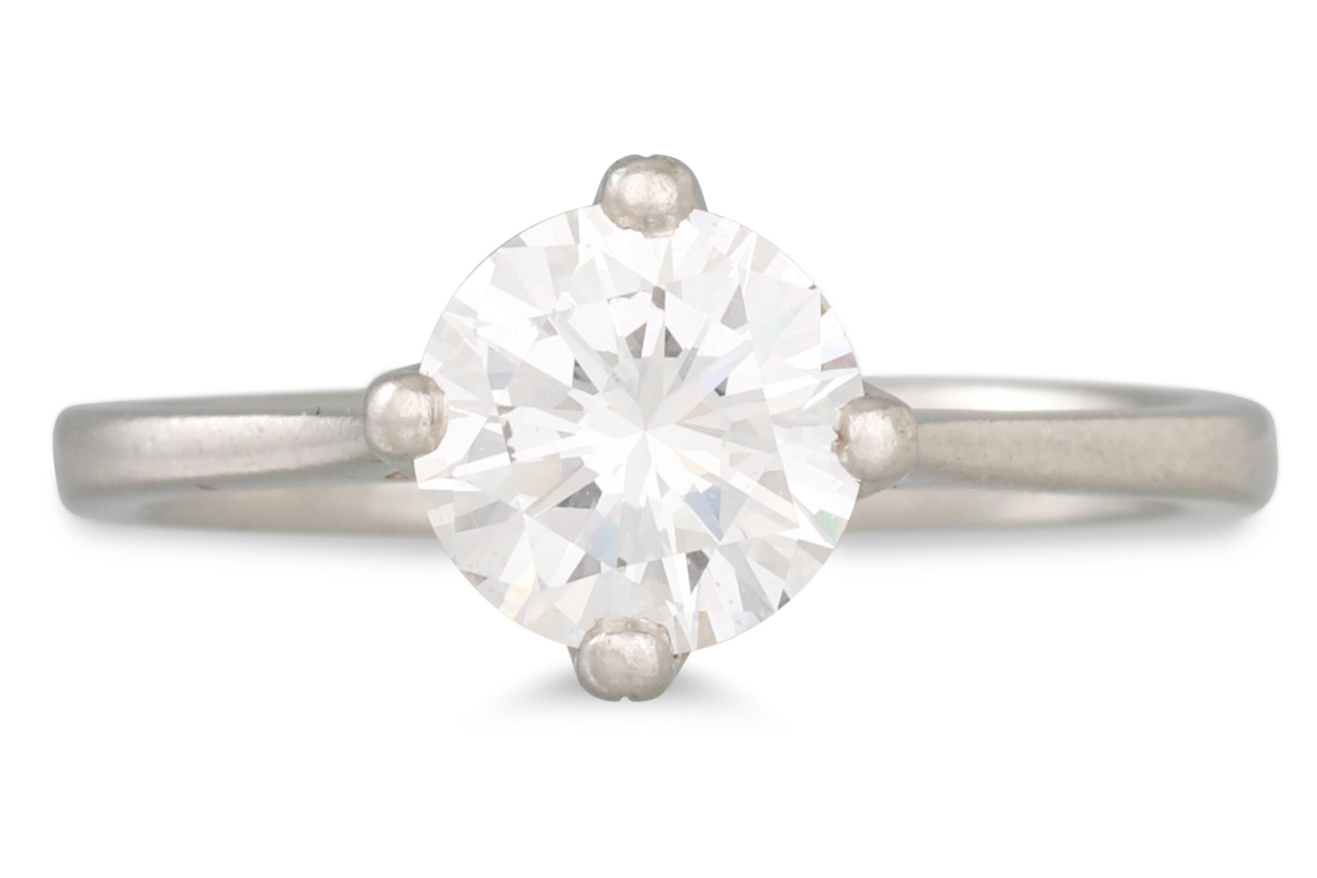 A SOLITAIRE DIAMOND RING, the brilliant cut diamond mounted in platinum. Together with a HRD Cert