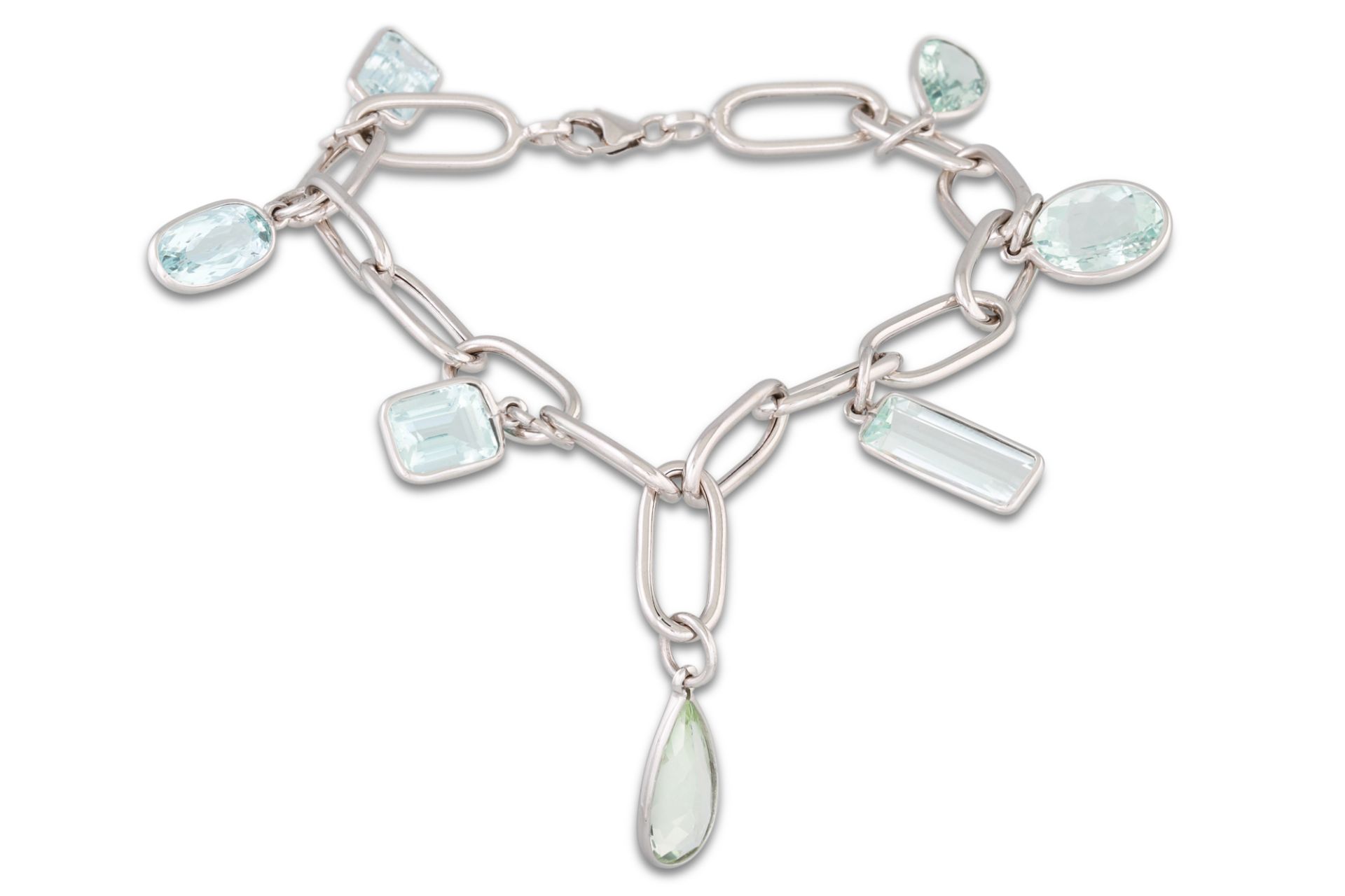 AN AQUAMARINE BRACELET, comprising of 18ct white gold links, suspending aquamarine charms.