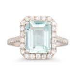 AN AQUAMARINE AND DIAMOND CLUSTER RING, the rectangular aquamarine to a brilliant cut diamond