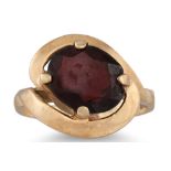 A GARNET SET DRESS RING, mounted in 9ct yellow gold, size O