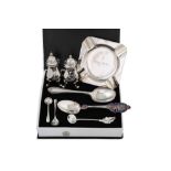 A COLLECTION OF SILVER HALLMARKED ITEMS, to include a pepper pot, spoons etc.