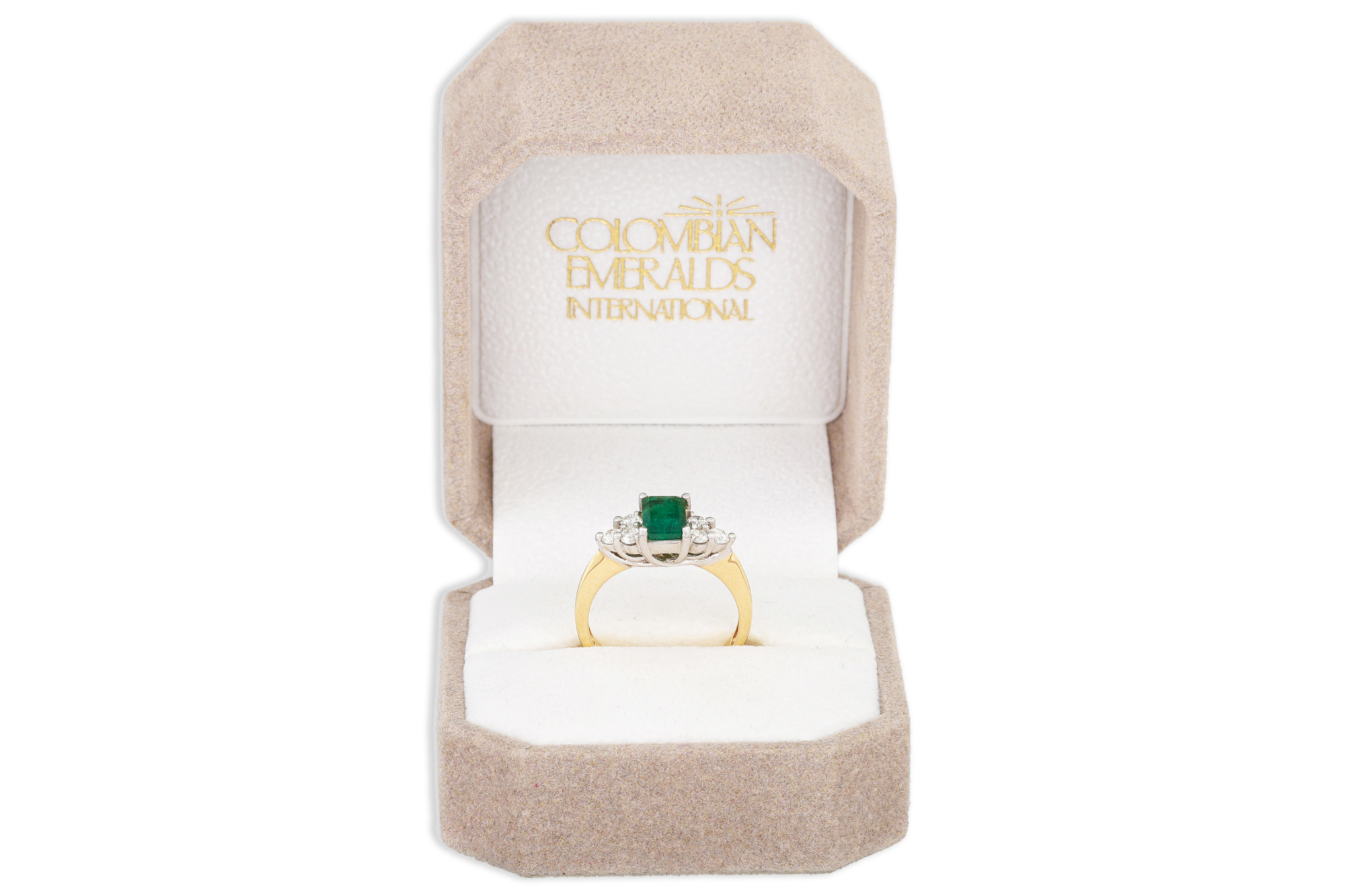 AN EMERALD AND DIAMOND THREE STONE RING, the rectangular emerald to diamond trio sides, mounted in - Image 2 of 2