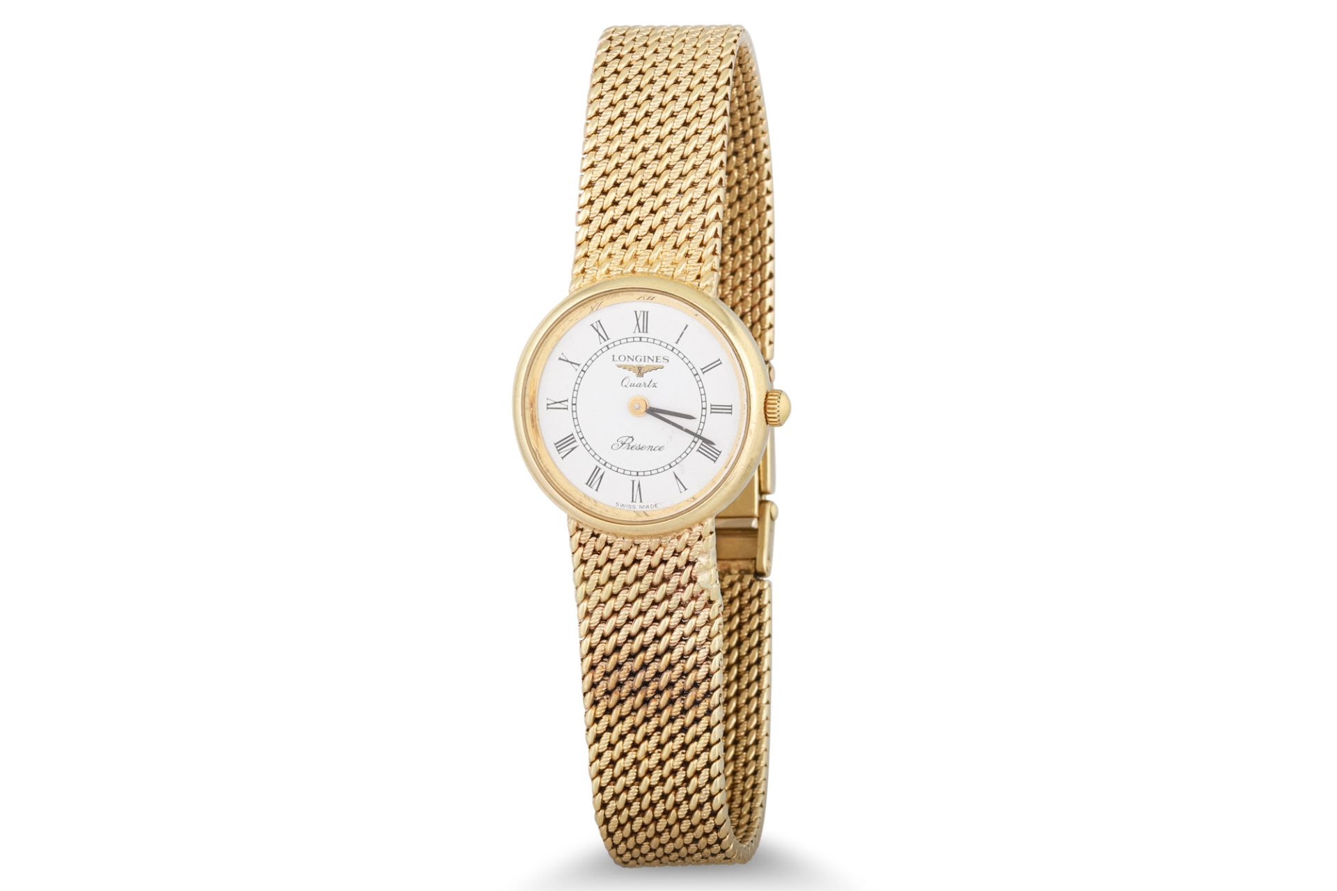 A LADY'S LONGINES "PRESENCE" QUARTZ WRISTWATCH, 9ct gold, white face with Roman numerals, integrated