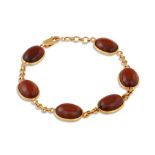 A GARNET SET BRACELET, mounted in 18ct gold