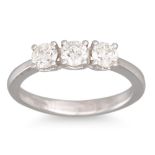 A THREE STONE DIAMOND RING, mounted in 18ct white gold. Estimated: weight of diamonds: 0.90 ct.