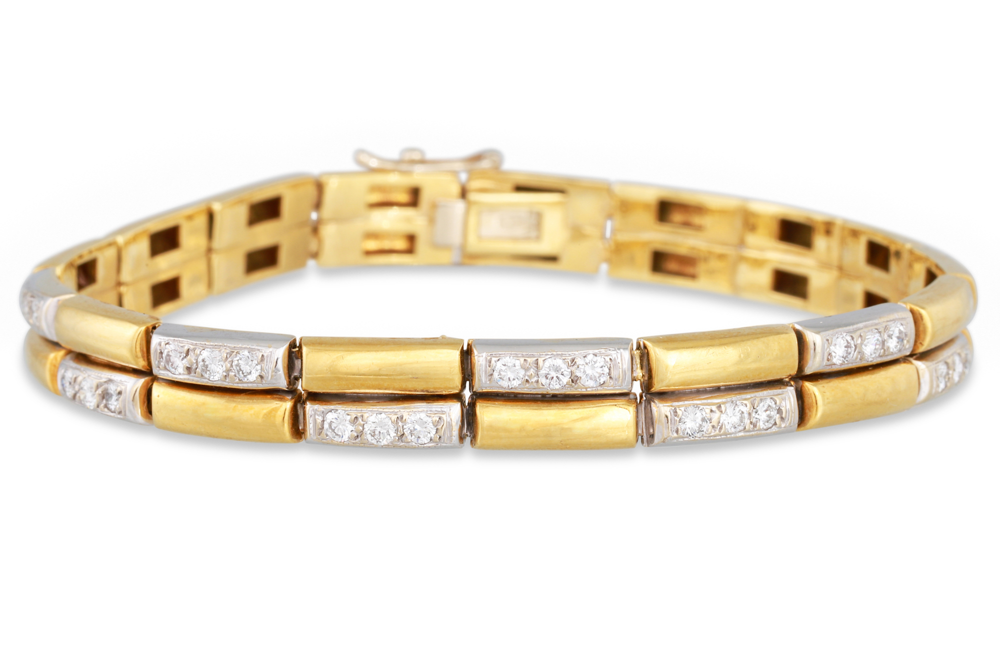 A DIAMOND SET PANEL BRACELET, the alternating diamond set links in 18ct yellow gold, 24.7 g.