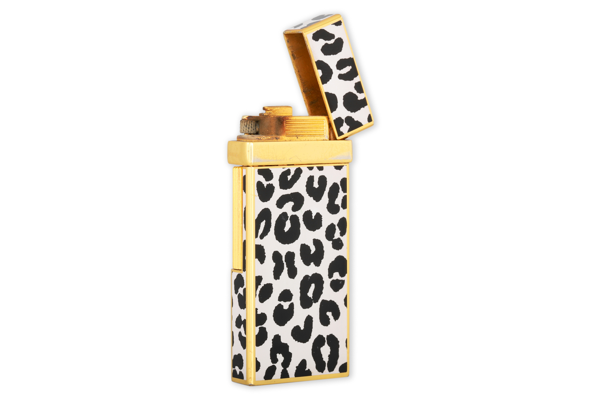 A YVES SAINT LAURENT ENAMEL LIGHTER, black & white design