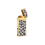 A YVES SAINT LAURENT ENAMEL LIGHTER, black & white design