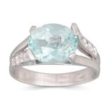 AN AQUAMARINE AND DIAMOND RING, the oval aquamarine to diamond shoulders, mounted in 18ct white