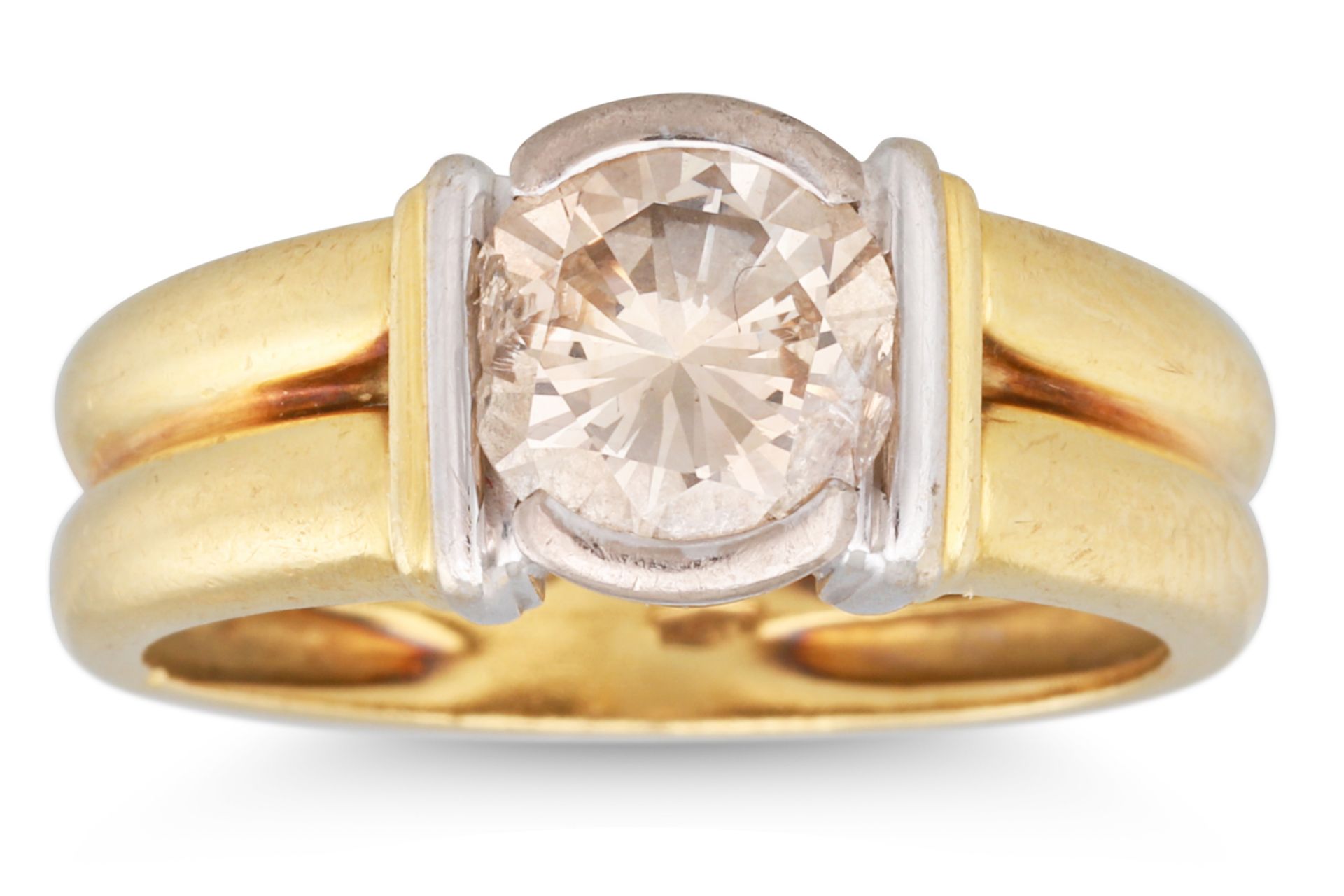 A DIAMOND SOLITAIRE RING, the round brilliant cut diamond to an 18ct yellow gold shank, together