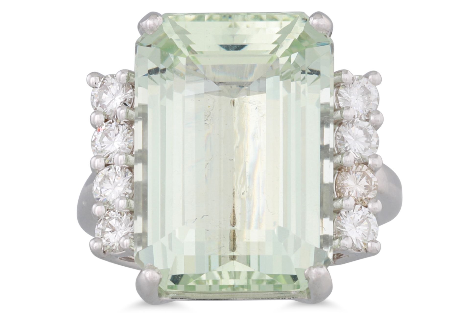 AN AQUAMARINE AND DIAMOND RING, the rectangular aquamarine to diamond shoulders, mounted in 18ct