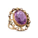 AN ANTIQUE GOLD AMETHYST AND PEARL RING, the oval amethyst to seed pearl surround of openwork