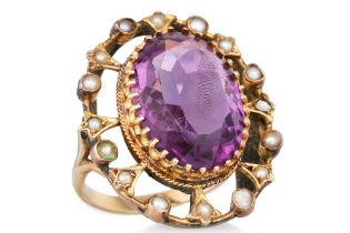 AN ANTIQUE GOLD AMETHYST AND PEARL RING, the oval amethyst to seed pearl surround of openwork