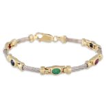 A RUBY, SAPPHIRE AND EMERALD BRACELET, mounted in 9ct yellow and white gold links, 13.7 g.