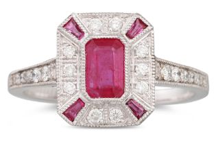 A DIAMOND AND RUBY ART DECO STYLE RING, the emerald cut ruby to diamond surround, mounted in 18ct
