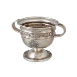 A PRE-WAR IRISH SILVER TWO HANDLE CELTIC STYLE CUP, in the manner of the Ardagh chalice, Dublin