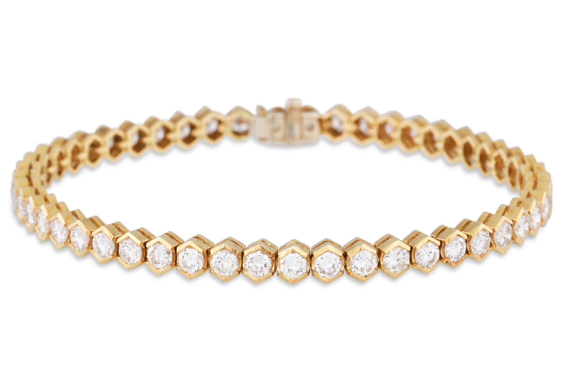 A DIAMOND LINE BRACELET, the brilliant cut diamonds in square box setting, in 18ct yellow gold.