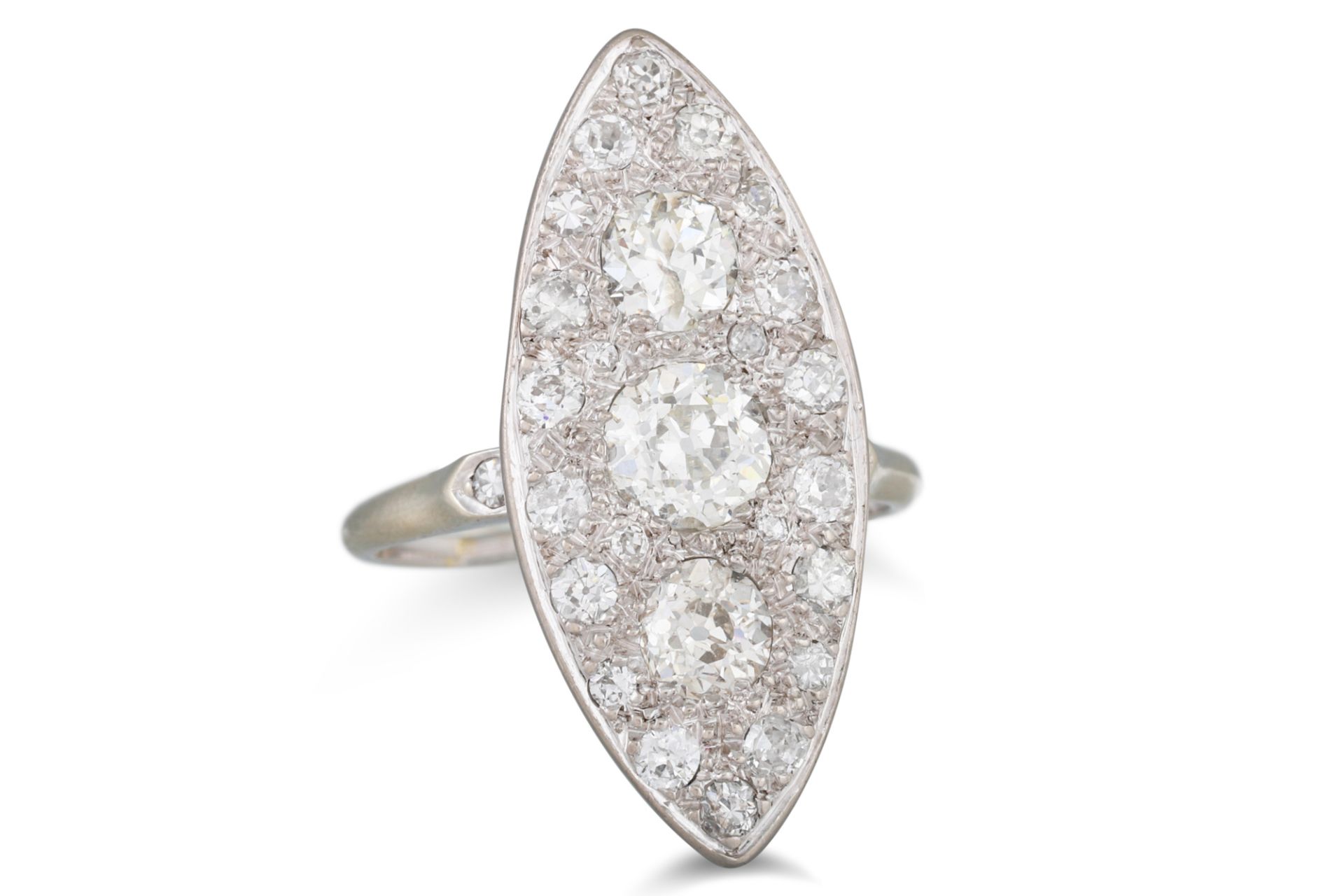 A BOAT SHAPED DIAMOND CLUSTER RING, set with old cut diamonds, mounted in white gold, French