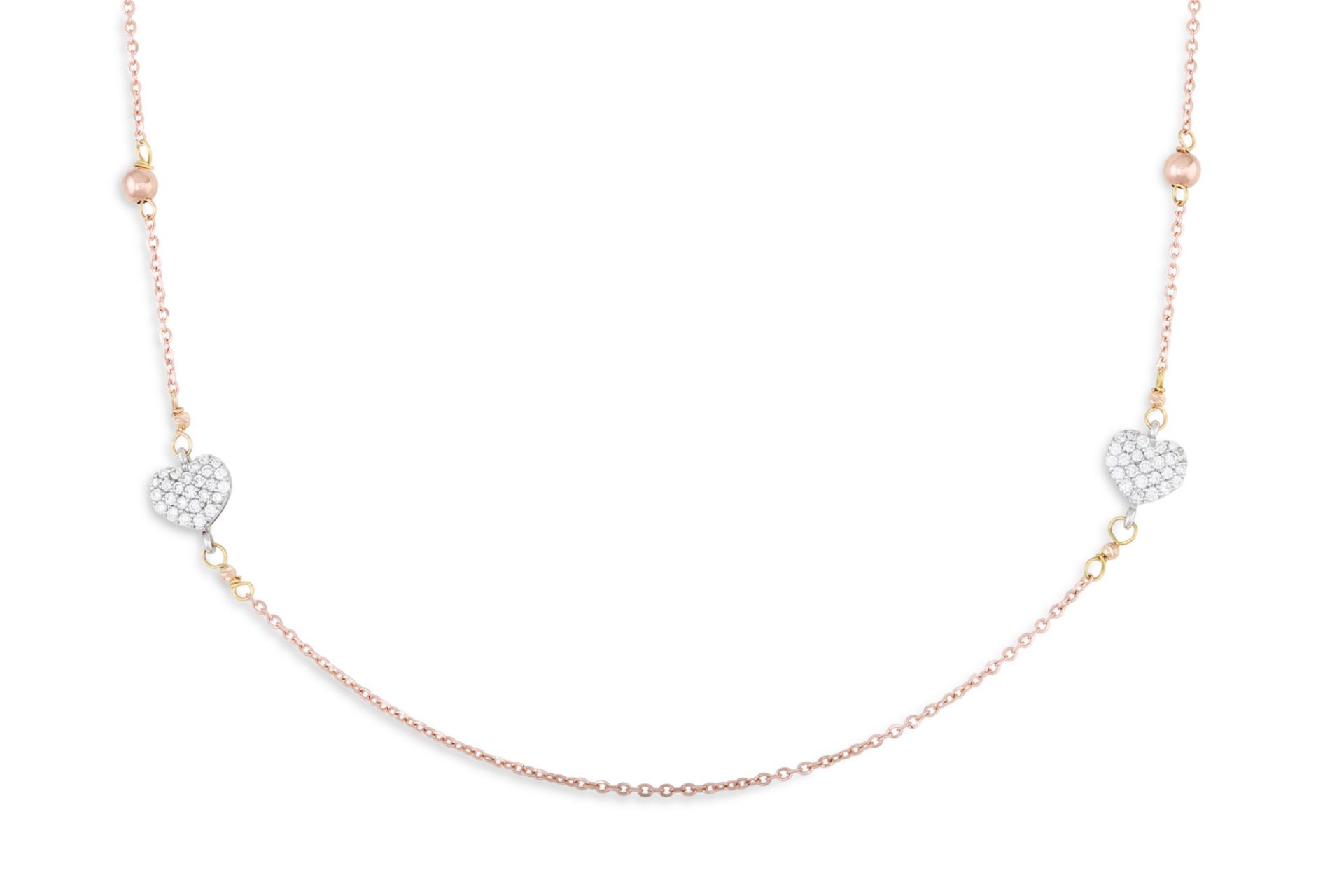 A DIAMOND SET NECKLACE, set with two pavé heart shaped panels to 18ct yellow gold chain links.