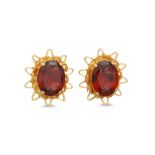 A PAIR OF GARNET EARRINGS, mounted in yellow gold