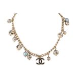 A CHANEL BEADED CHARM NECKLACE, the curb link chain suspending faux pearl and a double C charms,