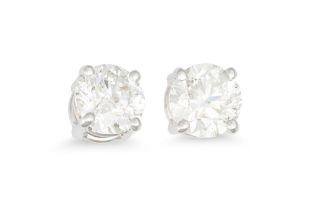 A PAIR OF DIAMOND STUD EARRINGS, the brilliant cut diamonds mounted in 18ct white gold. Estimated: