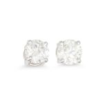 A PAIR OF DIAMOND STUD EARRINGS, the brilliant cut diamonds mounted in 18ct white gold. Estimated: