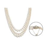 A CULTURED PEARL NECKLACE, the triple rowed graduated with 9ct gold clasp