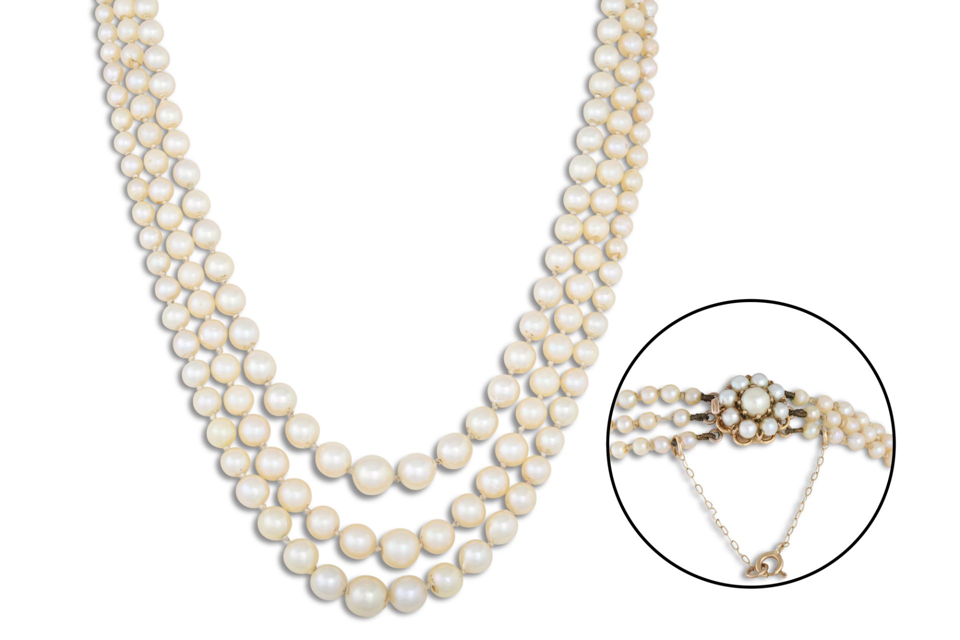 A CULTURED PEARL NECKLACE, the triple rowed graduated with 9ct gold clasp