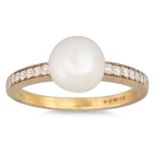 A DIAMOND AND PEARL RING, the white toned pearl to diamond shoulders, mounted in 18ct yellow gold,