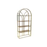 AN ETAGERES BOOKCASE, the art deco style shelf unit with five tinted glass shelves to a brass