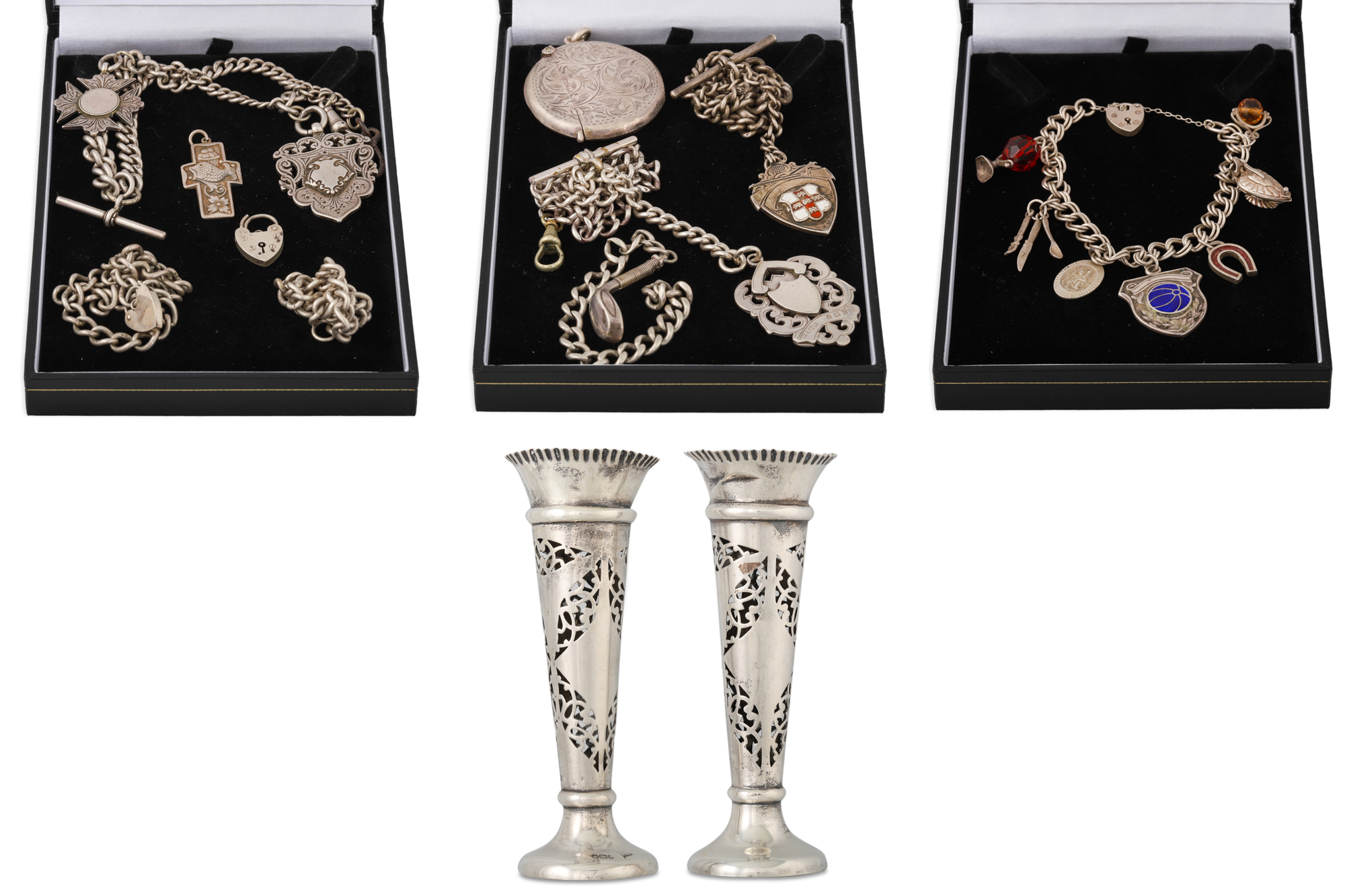 A PAIR OF SHEFFIELD SILVER ROSE BUD VASES, a silver matchbox and assorted chains & bracelets, 430
