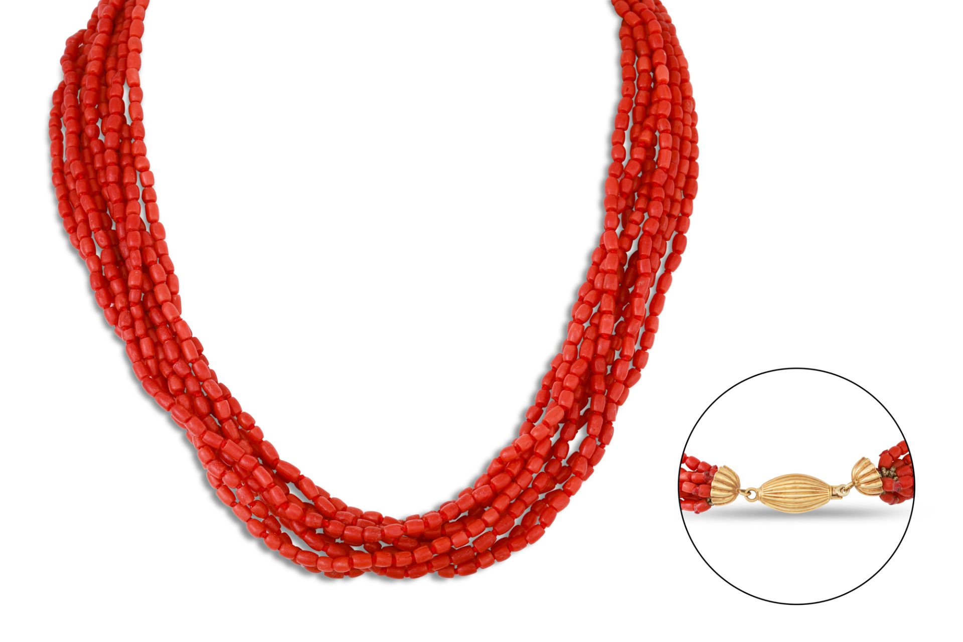 A MULTI-STRANDED BEADED CORAL NECKLACE, to a 18ct gold barrel clasp