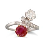 AN ANTIQUE RUBY AND DIAMOND TOI ET MOI RING, set with an old cut diamond and a circular ruby,