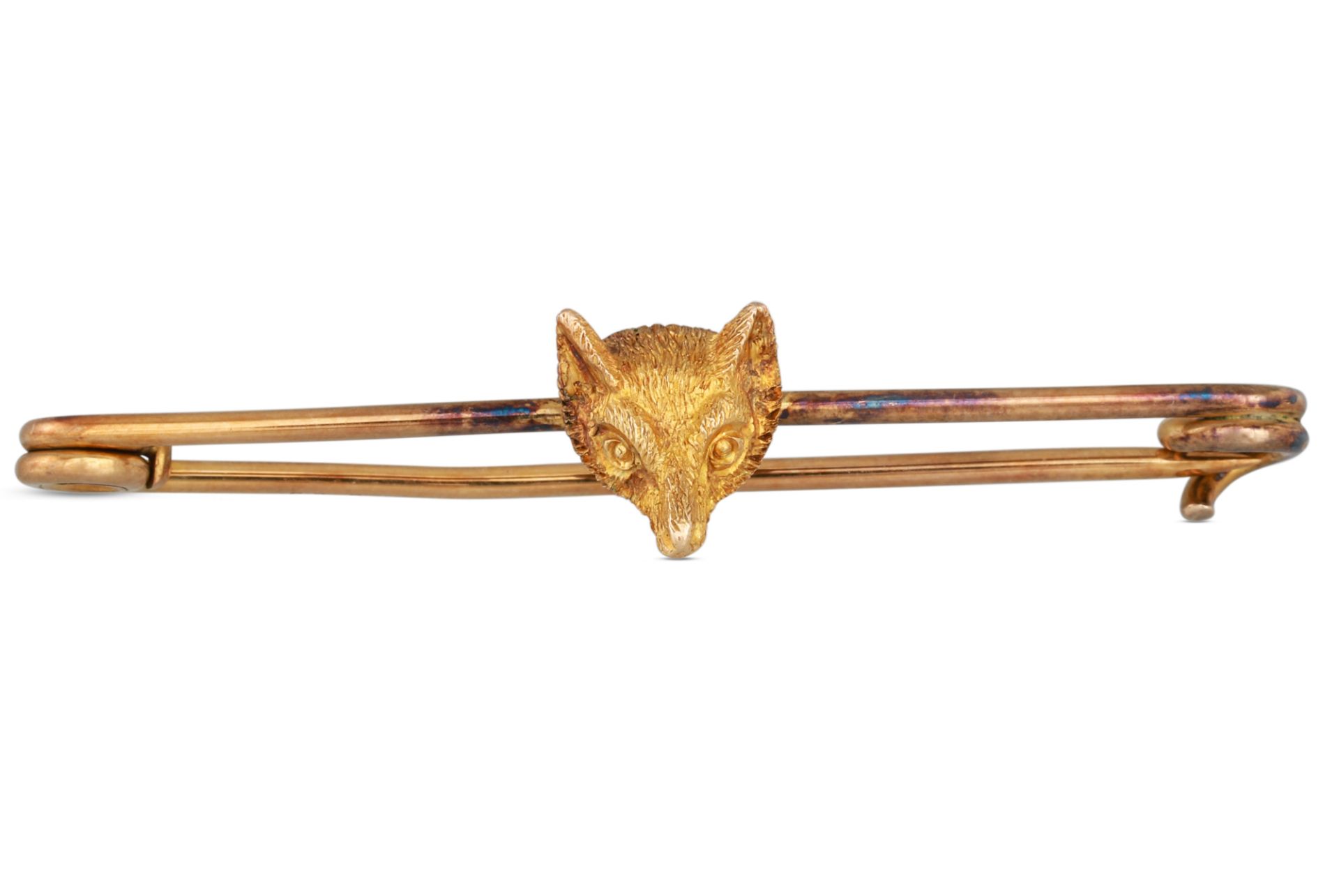 AN ANTIQUE GOLD FOX HEAD BROOCH