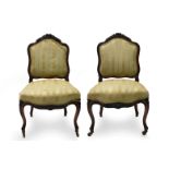 A PAIR OF ANTIQUE 19TH CENTURY FRENCH CARVED CHAIRS, upholstered on carved cabriole legs