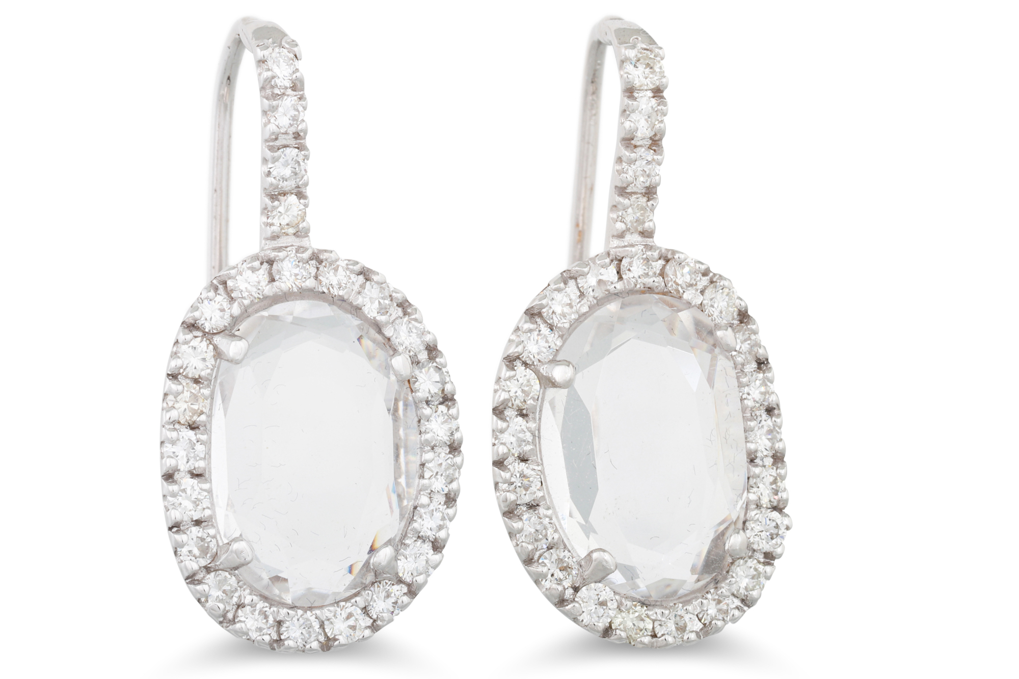 A PAIR OF ROCK CRYSTAL AND DIAMOND EARRINGS, the faceted quartz to diamond surrounds, in 18ct