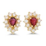 A PAIR OF DIAMOND AND RUBY CLUSTER EARRINGS, the pear shaped rubies to diamond surround, mounted