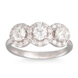 A DIAMOND TRIPLE CLUSTER RING, set with brilliant cut diamonds, mounted in 18ct white gold.