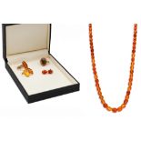 A SUITE OF AMBER JEWELLERY, to include a necklace, ring, two pairs of earrings and an agate set