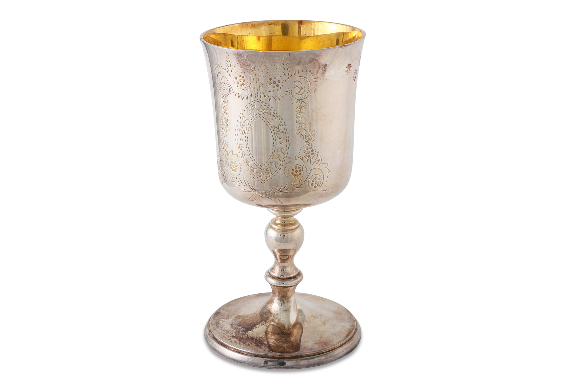 A LATE 20TH CENTURY IRISH SILVER GILT CHALICE/GOBLET, with engraved decoration, raised over a